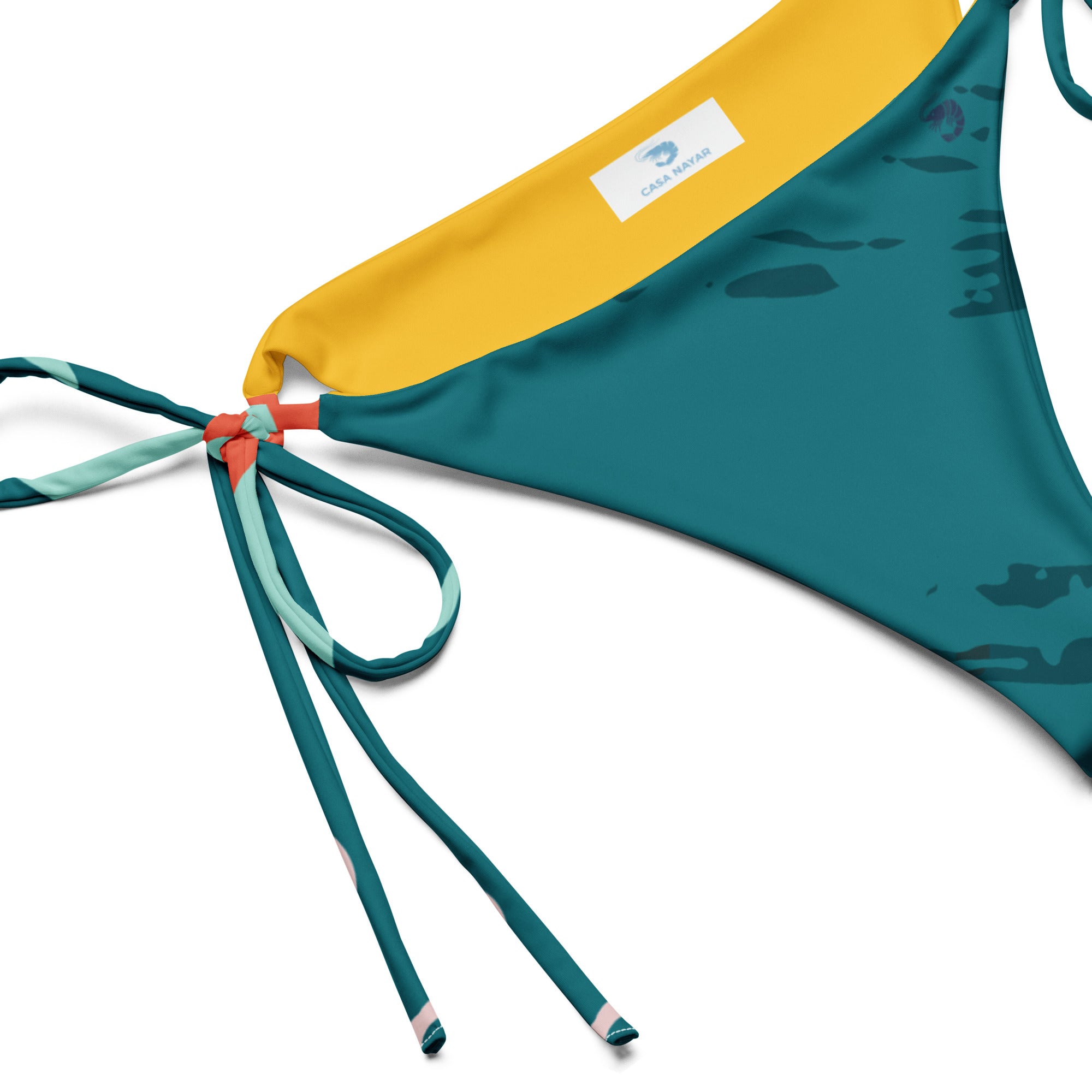 Casa Nayar Coastal String Bikini Bottom — front view, teal tropical all-over print with blue shrimp logo at left hip