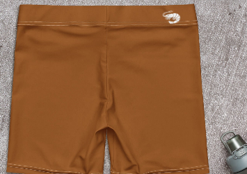 Casa Nayar Coastal AOP Shorts - flat lay front view showing shrimp logo on waistband